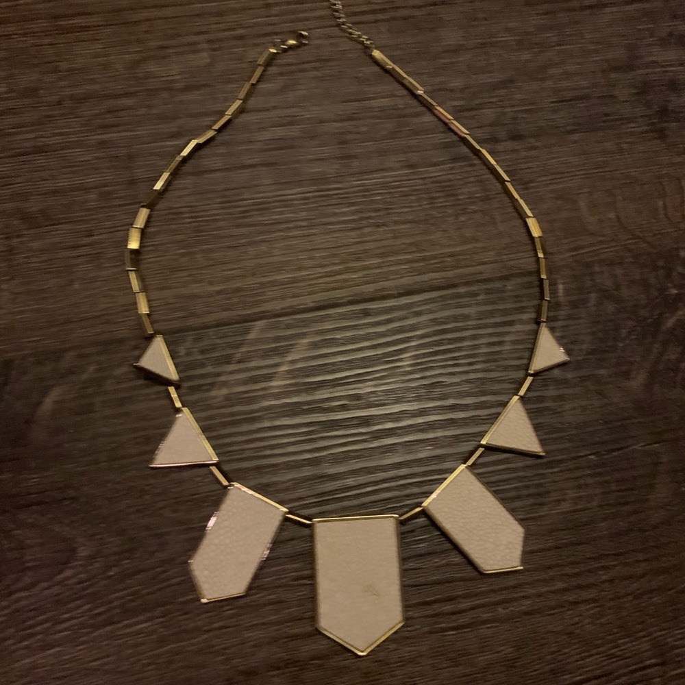 House of Harlow white leather necklace. Gold chain